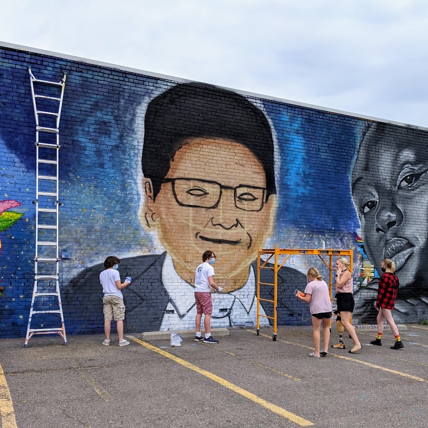 Students painting the Kendrick Castillo memorial mural with CSAC